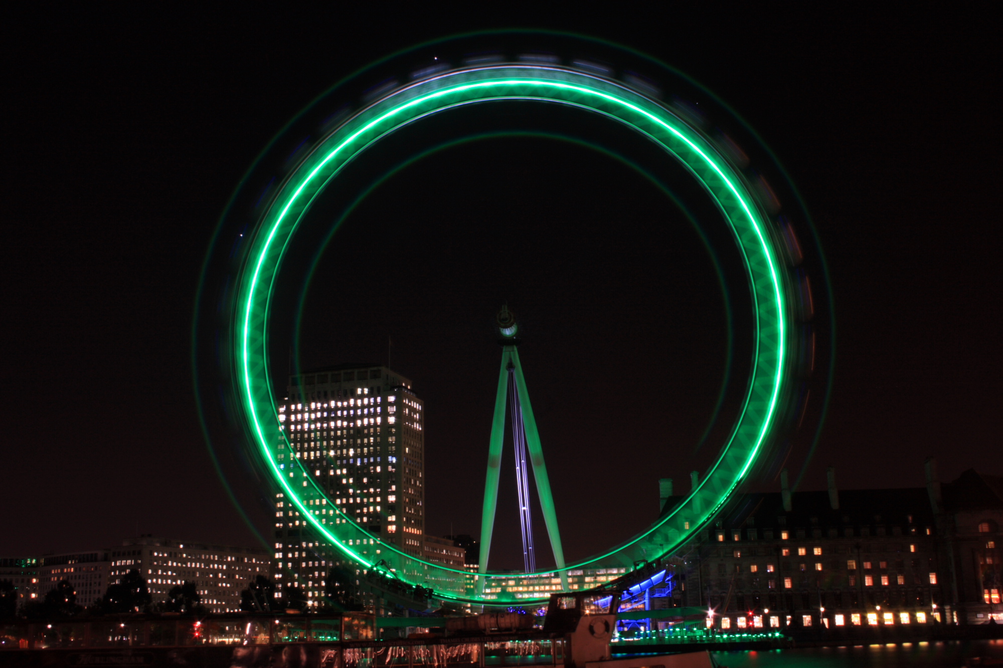 The London Eye spinning at night