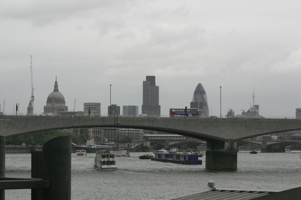 View down the Thames towards the city from Victoria Embankment, shot includes St Pauls Cathedral on the left, Nat West Tower in the centre and the Swiss Re Tower on the right.