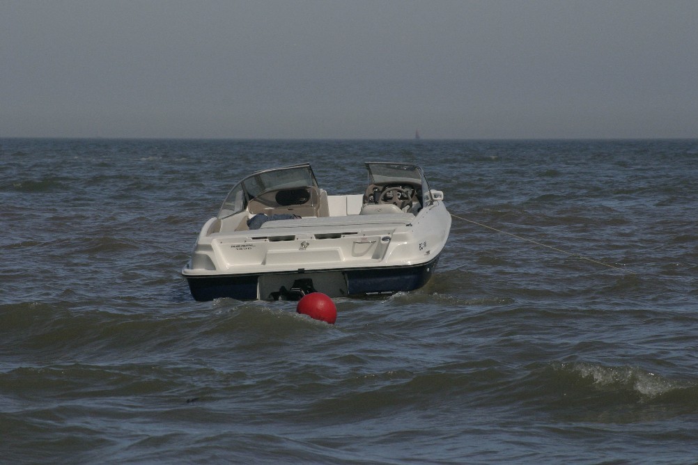 Boat moored on the beach at Clacton-on-Sea.