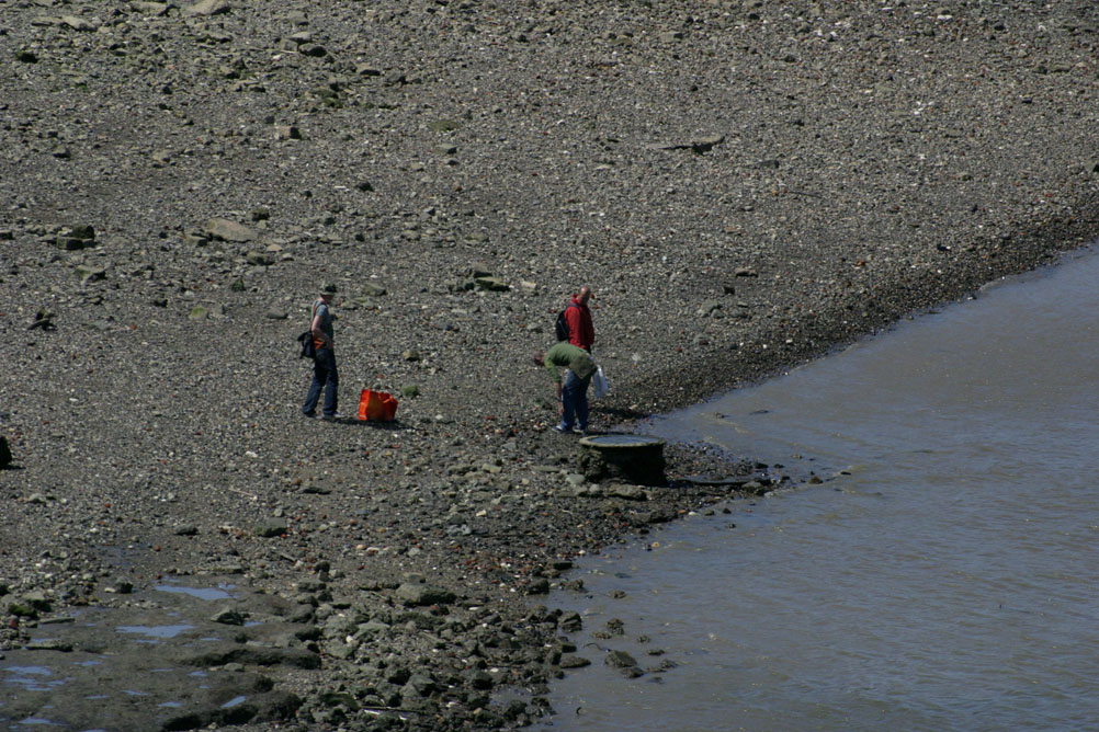 Beach Combers on the Thames at low tide.