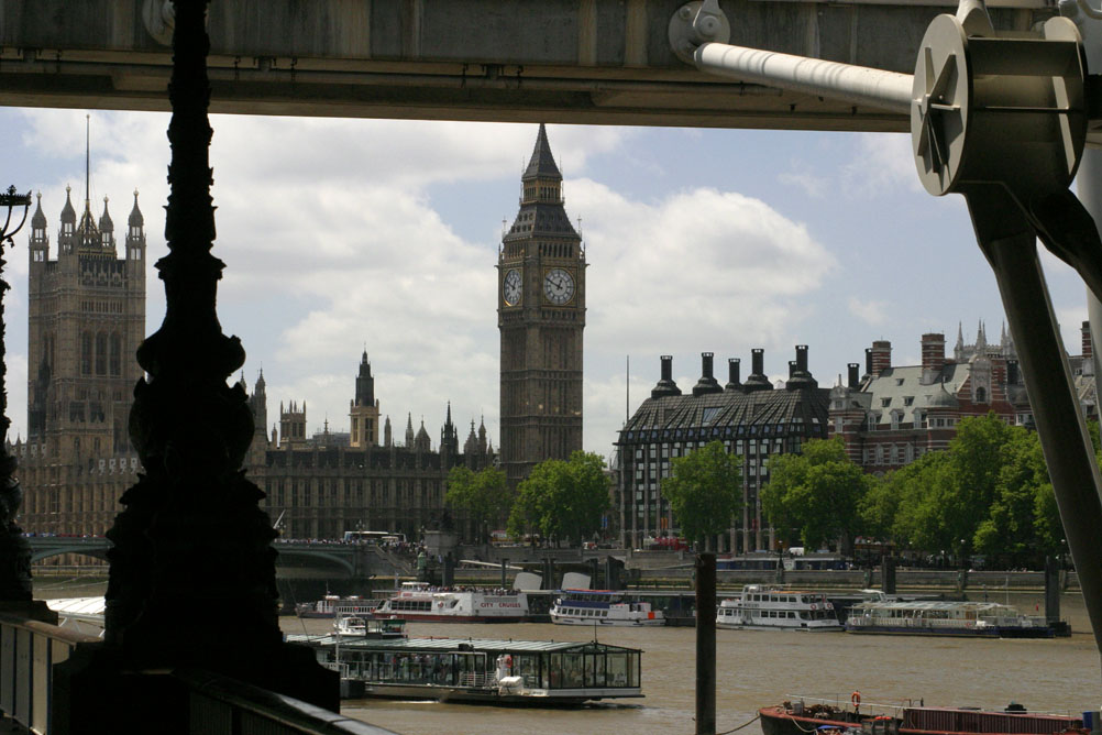 Big Ben and Houses of Parliament as viewed from under Hungerford Bridge.